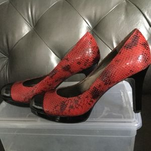 Red and black snakeskin platform heels